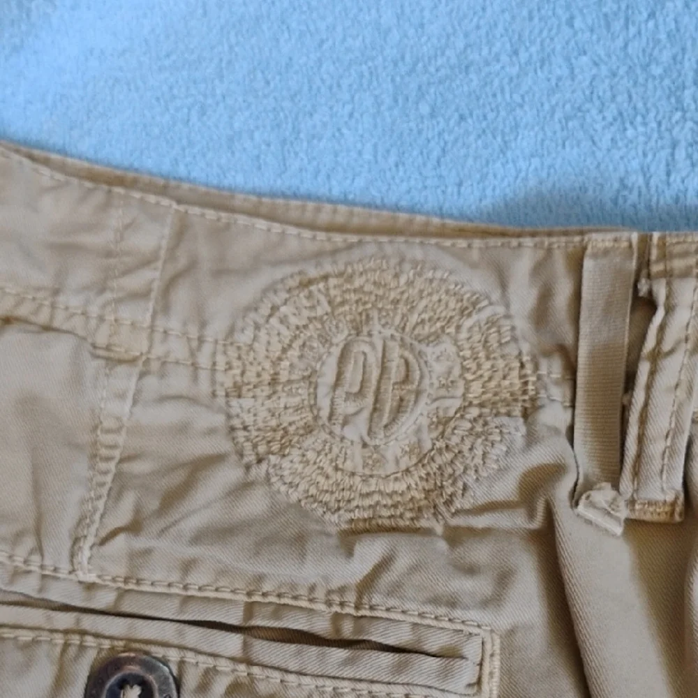 Paperbacks Tan Flat Front Shorts